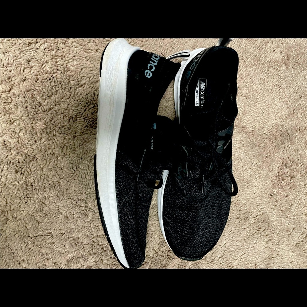 Black New Balance shoes. Size 10.